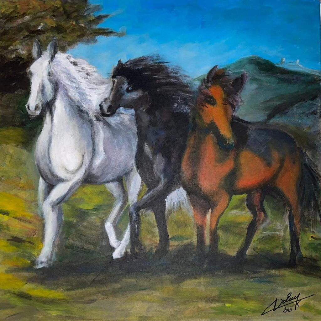 Chevaux blanc, brun et noir