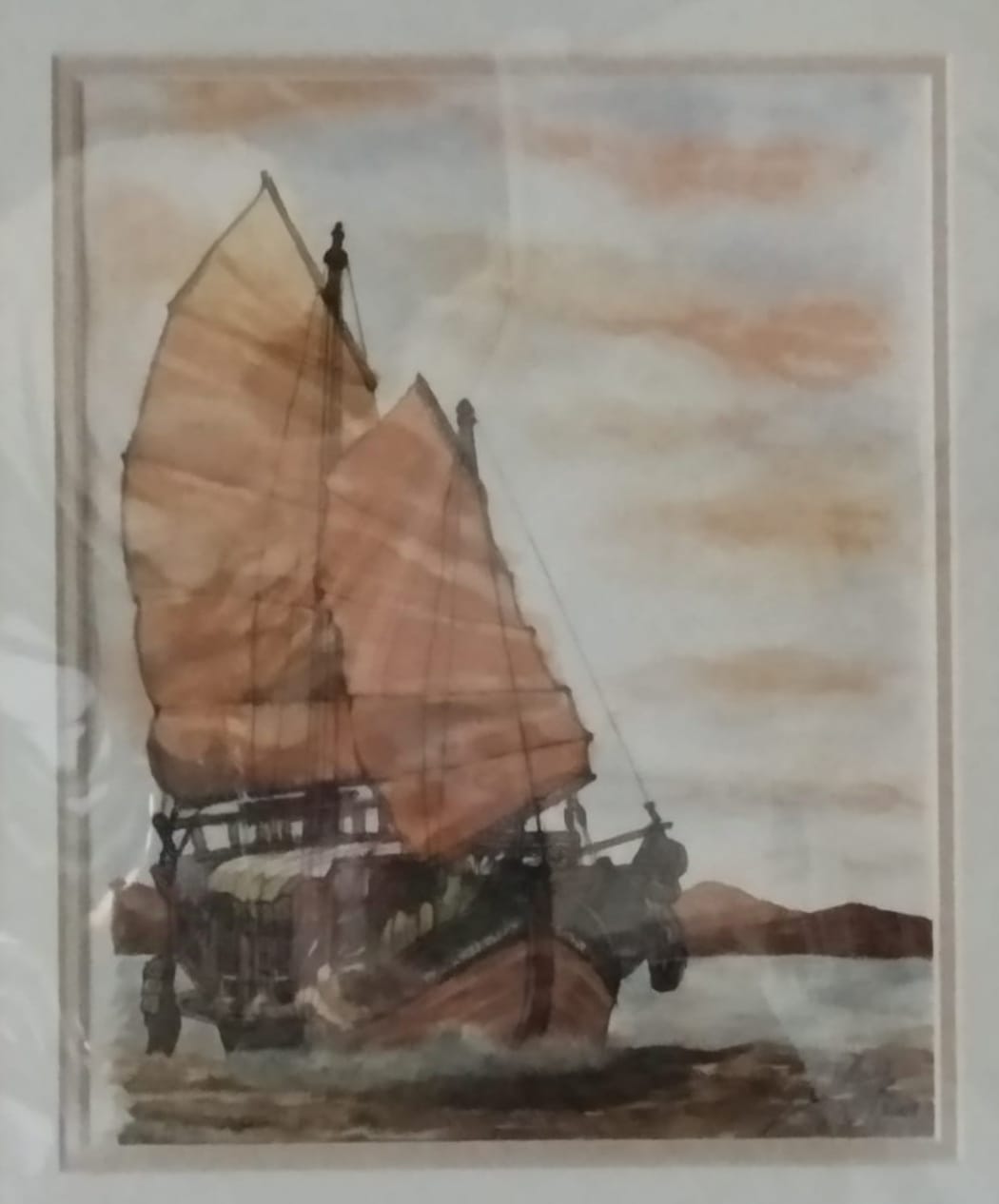 Voilier à la voile brune