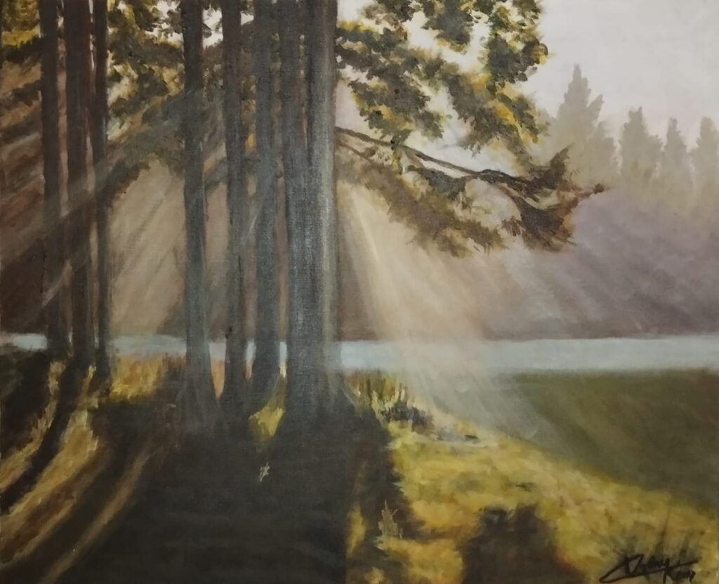 Rayons de soleil perçant la montagne